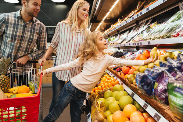 8817564 Stock Photo Family With Shopping Cart In Supermarket
