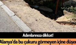 Adımlarınıza dikkat! Alanya'da bu çukuru görmeyen içine düşer