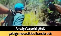 Antalya'da polisi gördü, çaldığı motosikleti kanala attı