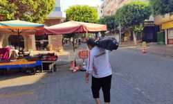 Alanya'da sırtında dev poşetle yürürken görenler şoke oldu