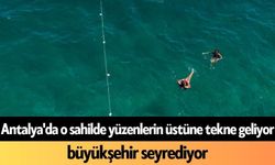 Antalya'da o sahilde yüzenlerin üstüne tekne geliyor, büyükşehir seyrediyor