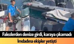 Falezlerden denize girdi, karaya çıkamadı