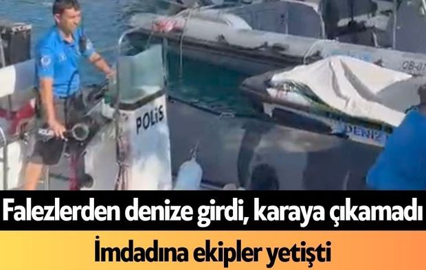 Falezlerden denize girdi, karaya çıkamadı