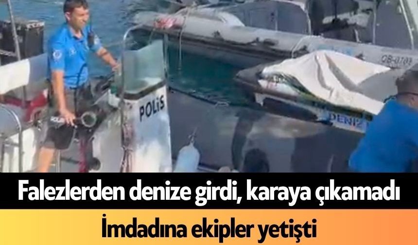 Falezlerden denize girdi, karaya çıkamadı